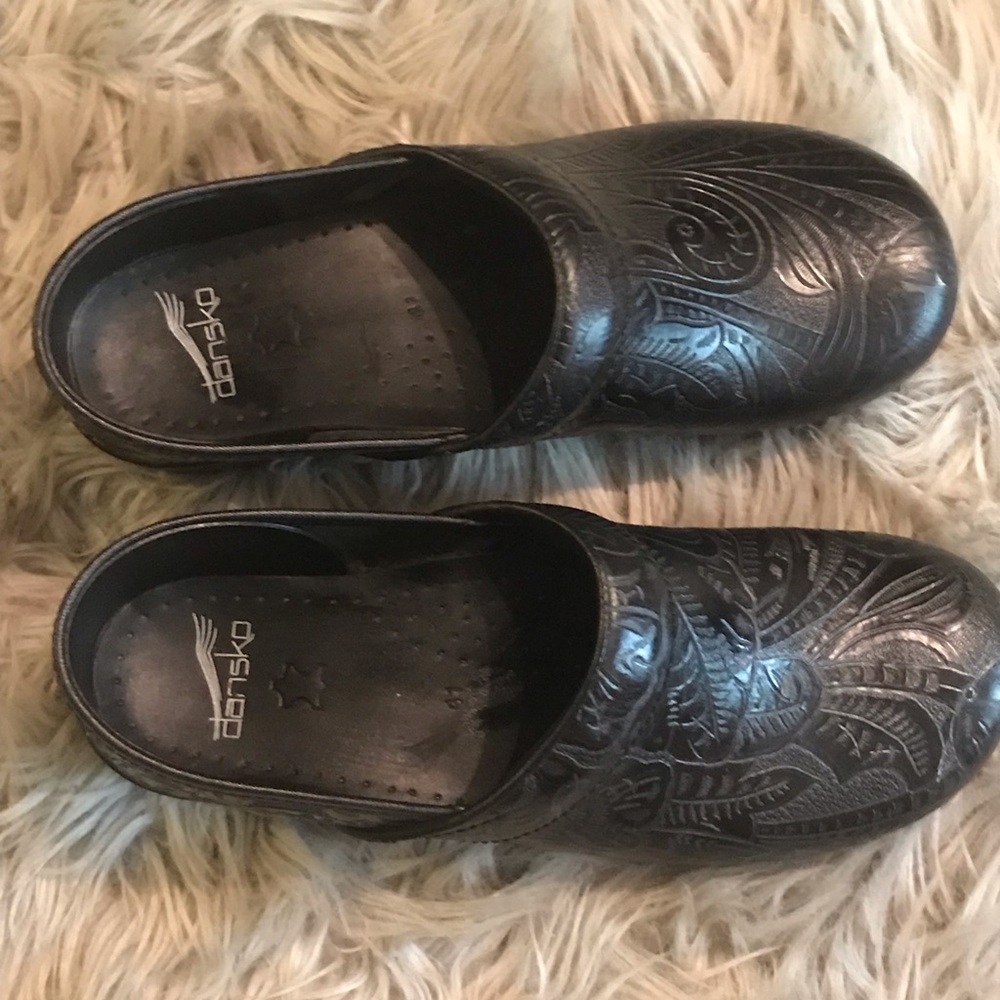 Dansko tooled leather clogs